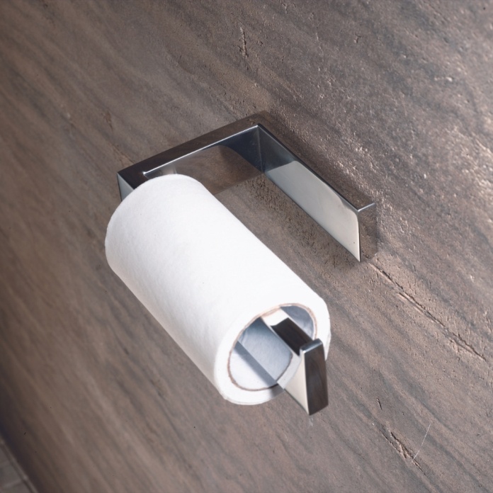 Close up product lifestyle image of the Abacus Pure Chrome Toilet Roll Holder